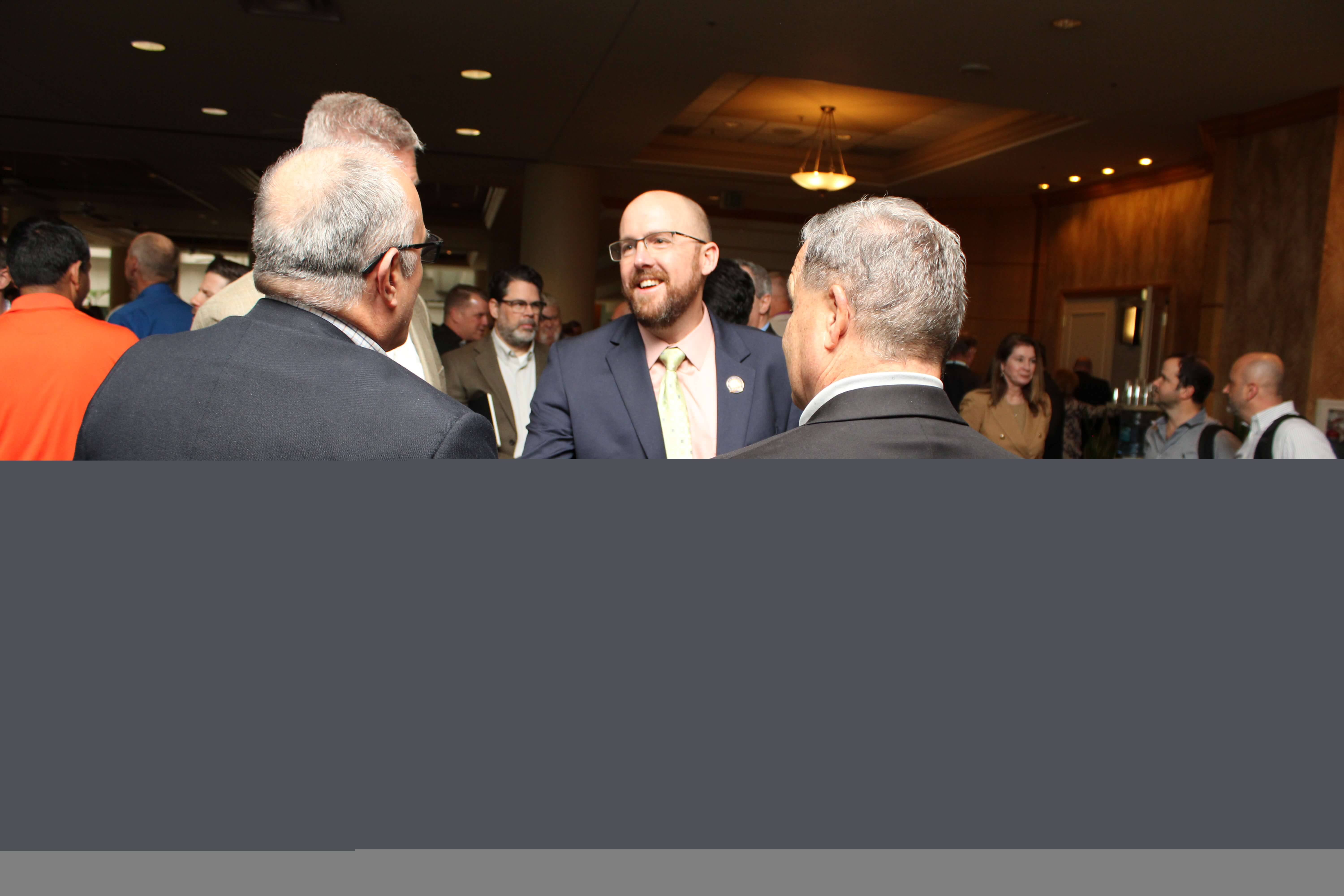 Secretary Jared Perdue meets with attendees at the 2024 FDOT Industry Forum.