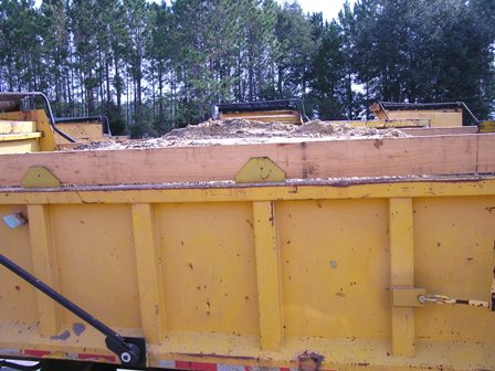 This is a picture showing a laser scan borrow truck process.