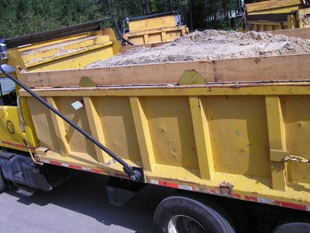 This is a picture showing a laser scan borrow truck process.