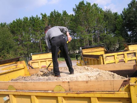 This is a picture showing a laser scan borrow truck process.