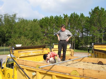 This is a picture showing a laser scan borrow truck process.