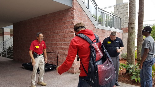 Picture of two teens using distracted driving goggles to walk outside
